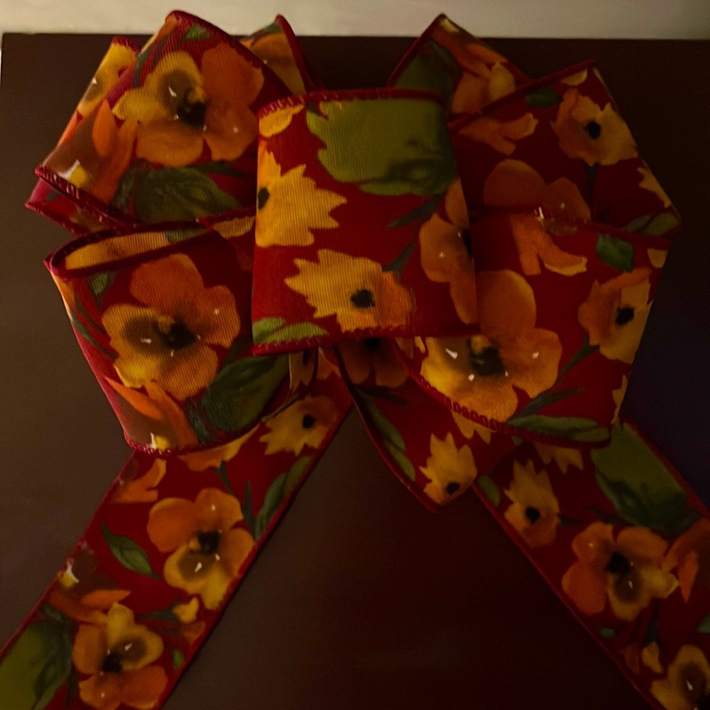Burgundy bow with shades of dark orange,beige, brown and green